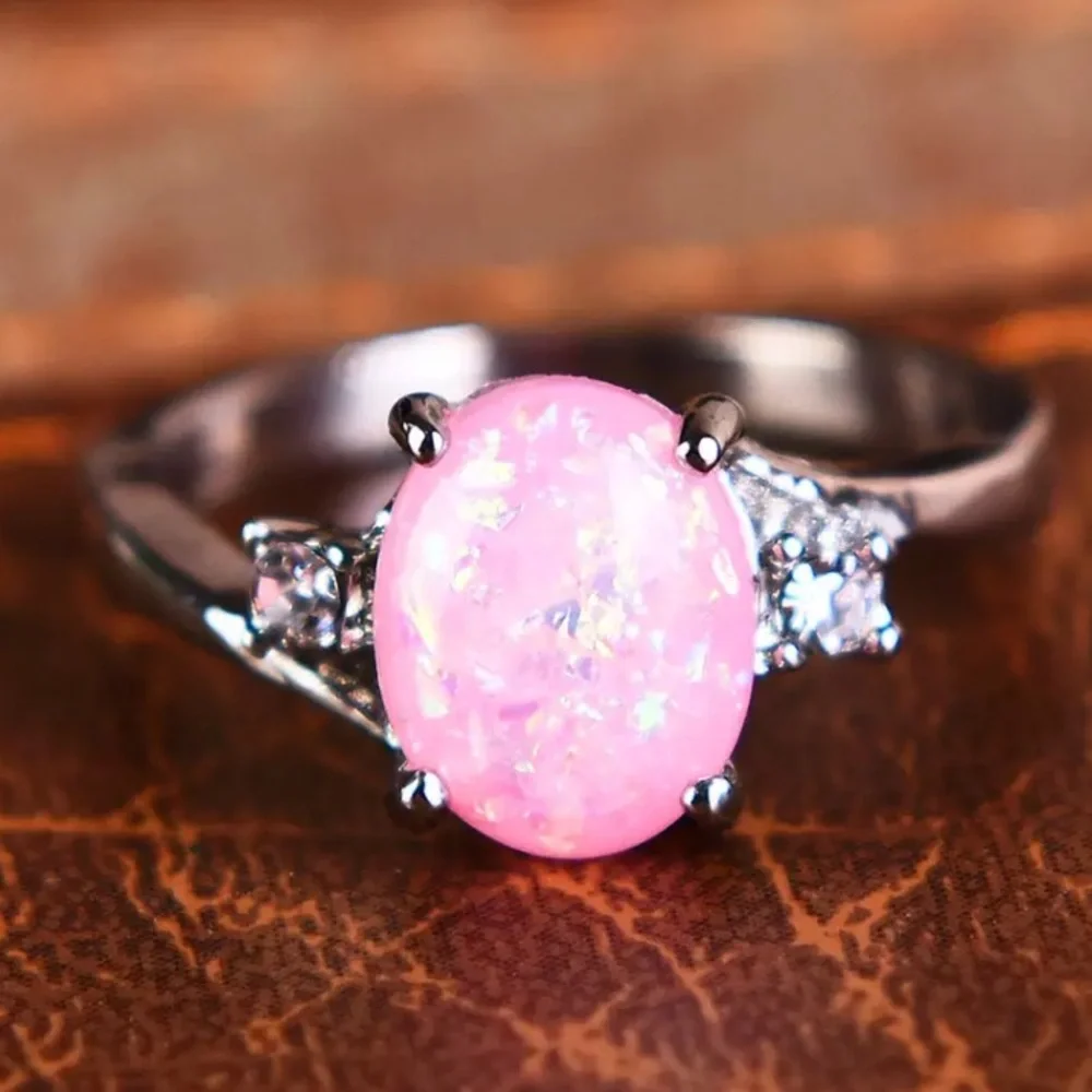 BRAND NEW.925SS OVAL CUT PINK OPAL RING